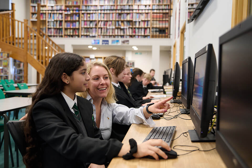 Daisy with school pupils